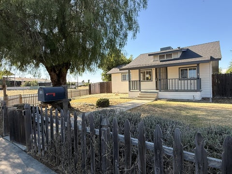 Photo of 103 E Firebaugh Avenue, Exeter, CA 93221 (MLS # 243850)