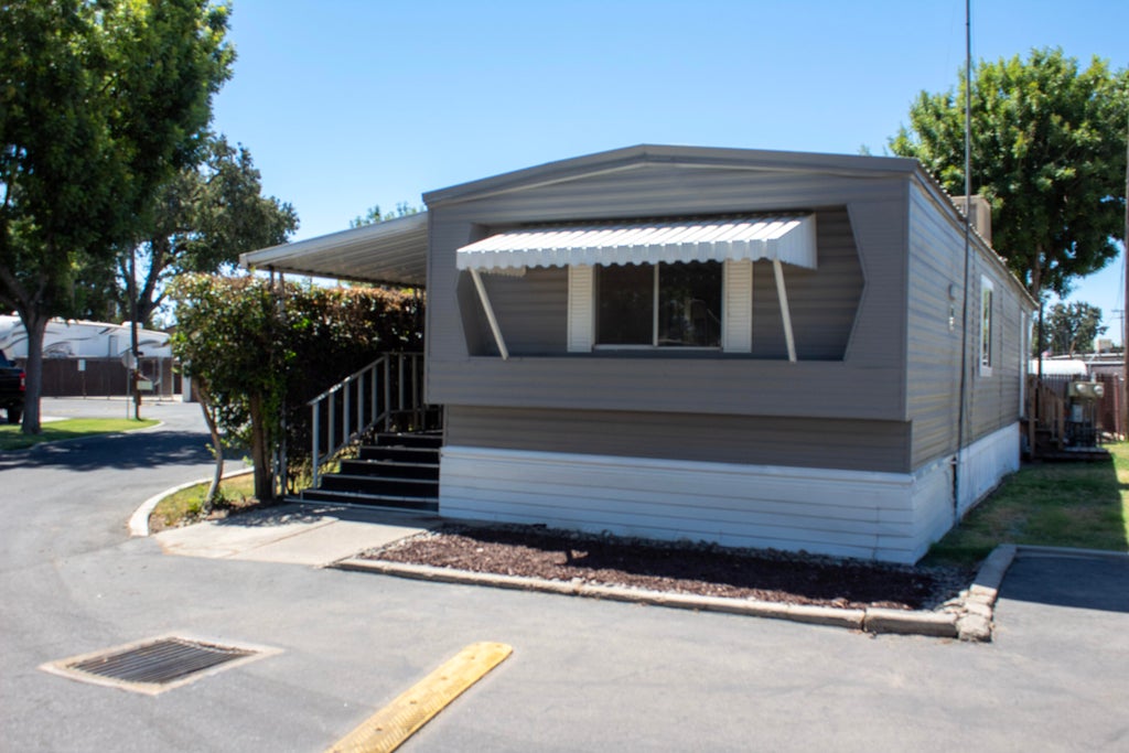 Photo of 820 S Chinowth Street 12 #12, Visalia, CA 93277 (MLS # 243837)