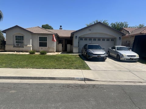 Photo of 1538 W Picadilly Court W, Hanford, CA 93230 (MLS # 242059)