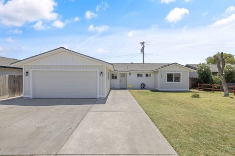Photo of 883 Clover Lane, Hanford, CA 93230 (MLS # 243540)