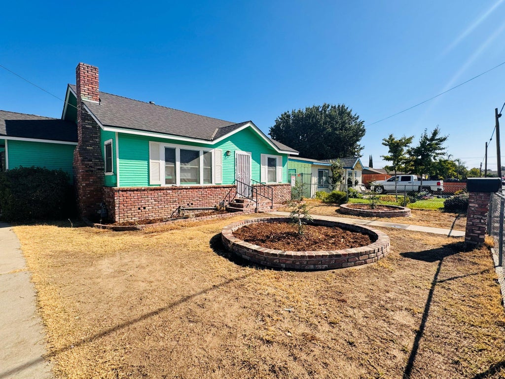 Photo of 232 E Sweet Avenue, Visalia, CA 93291 (MLS # 244103)