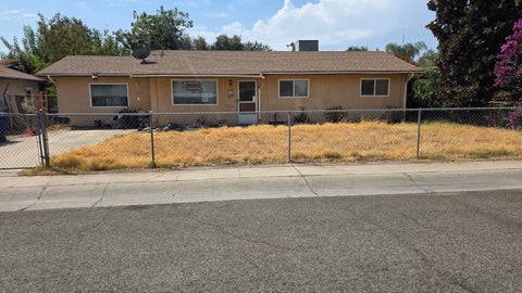 Photo of 631 E Costner Street, Farmersville, CA 93223 (MLS # 243836)