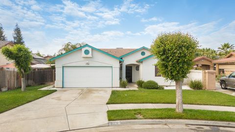 Photo of 722 W Marilyn Court, Farmersville, CA 93223 (MLS # 241227)