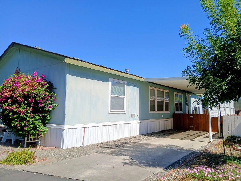 Photo of 2400 W Midvalley Avenue Q7 #Q7, Visalia, CA 93277 (MLS # 243260)