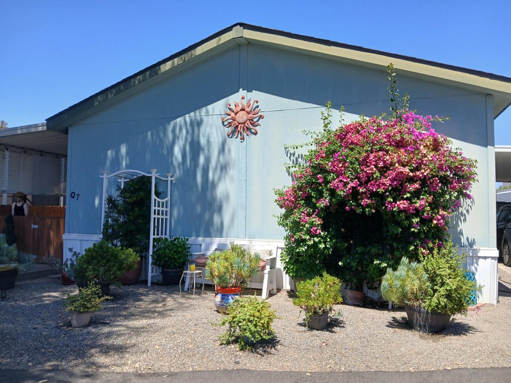 Photo of 2400 W Midvalley Avenue Q7 #Q7, Visalia, CA 93277 (MLS # 243260)