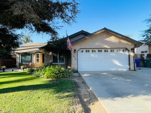 Photo of 314 W Greg Street, Farmersville, CA 93223 (MLS # 244529)