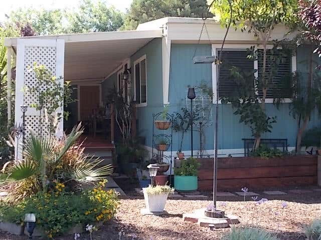 Photo of 2400 W Midvalley Avenue J-01 #J-01, Visalia, CA 93277 (MLS # 242063)