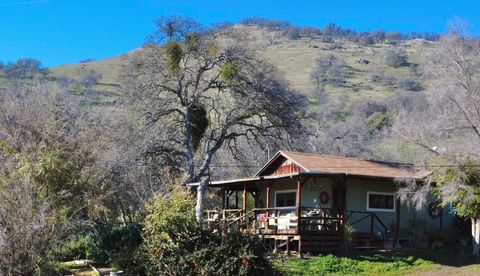 Photo of 30284 Bear Mountain Road, Yokuts Valley, CA 93675 (MLS # 242426)