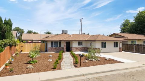 Photo of 634 W Theta Avenue, Porterville, CA 93257 (MLS # 241696)