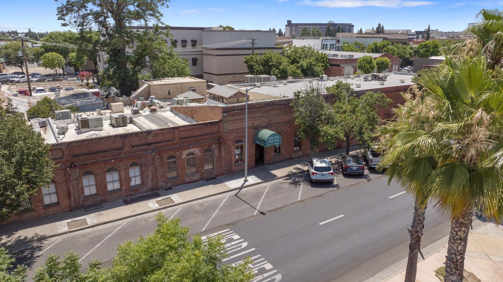 Photo of 417 E Center Avenue, Visalia, CA 93291 (MLS # 243453)