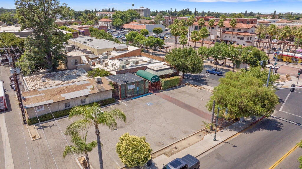 Photo of 417 E Center Avenue, Visalia, CA 93291 (MLS # 243453)
