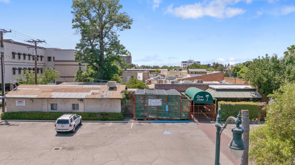 Photo of 417 E Center Avenue, Visalia, CA 93291 (MLS # 243453)