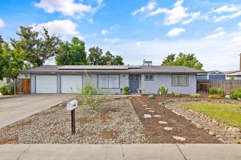 Photo of 922 W Feemster Avenue, Visalia, CA 93277 (MLS # 243040)