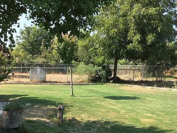 Photo of 12261 Avenue 322, Visalia, CA 93291 (MLS # 244616)