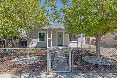 Photo of 405 E Mariposa Street, Avenal, CA 93204 (MLS # 243622)