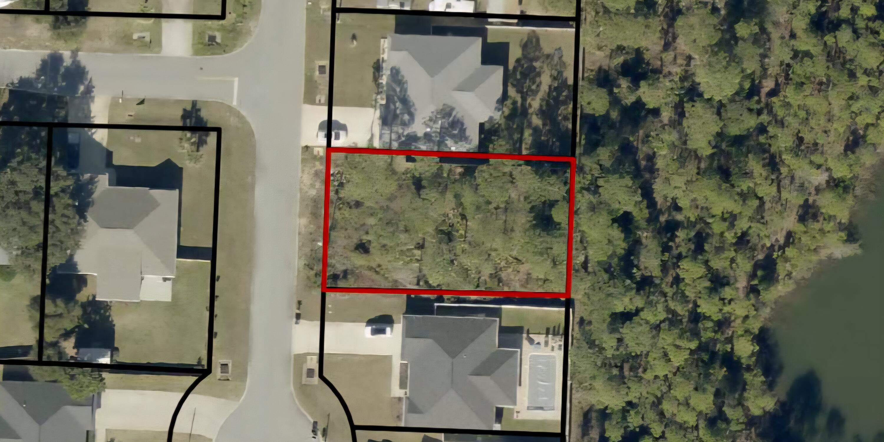 This vacant lot offers the perfect blend of convenience and coastal charm, set in a beautiful neighborhood with no HOA dues. Ideally located between Pensacola and Navarre Beach, the property is just minutes from a public boat ramp, making it easy to enjoy life on the water.Whether your perfect day includes fishing from the Gulf Coast's longest pier, snorkeling along vibrant reefs, setting out on a deep-sea adventure, collecting seashells, or simply relaxing with a book by the shore, this location provides endless opportunities to embrace the coastal lifestyle. Navarre Beach itself spans only four miles and is one of just ten beaches in the nation preserved as a National Seashore, offering natural beauty and tranquility that is truly one of a kind. With Navarre Beach only 10 minutes away and Pensacola less than a 30-minute drive, you'll always be close to white-sand beaches, waterfront dining, shopping, and entertainment. This lot is a rare opportunity to build your dream home in a setting that combines everyday convenience with the best of Florida's Gulf Coast living.