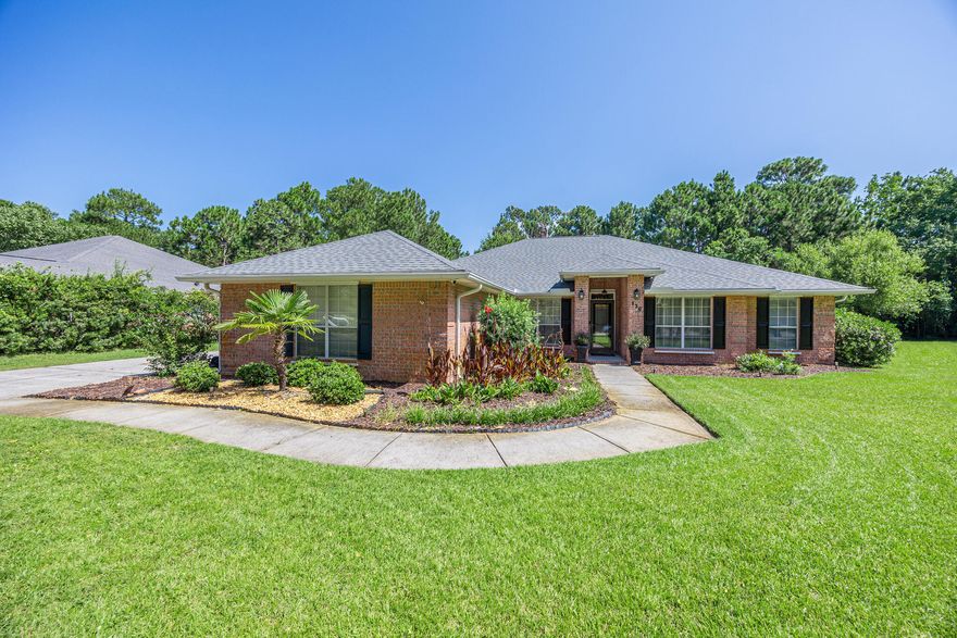 SELLER OFFERING $2,000 IN CONCESSIONS.Welcome to your own private retreat in the desirable Driftwood Estates community of Santa Rosa Beach. This spacious 4-bedroom, 2-bath all-brick home offers 2,792 square feet of comfort and style, nestled on over half an acre of serene landscaped grounds. From the moment you arrive, you're greeted by charming curb appeal, mature landscaping, and an inviting walkway leading to the covered front entry.Step inside to discover a living and kitchen space designed for effortless entertaining and daily comfort. The kitchen impresses with rich granite countertops, a spacious island with double sinks, stainless steel appliances including a gas range and built-in microwave, and cream cabinetry with elegant detailing providing abundant storage. abundant storage. Tile backsplash, pendant lighting, and a sun-filled dining nook overlooking the backyard oasis complete this warm and functional heart of the home.

Flowing seamlessly into the living room, you'll find beautiful wood flooring, vaulted ceilings, and a cozy electric  fireplace framed with timeless trim  perfect for quiet mornings with coffee or relaxed evenings gathered with family and friends. Just off the living area, the 10' x 22' heated and cooled Florida room provides an ideal space for year-round enjoyment.

The primary suite is a tranquil retreat featuring wood flooring, board-and-batten accent walls, and abundant natural light. The renovated ensuite bath feels like your own spa getaway, with a freestanding soaking tub, floor-to-ceiling tiled walk-in shower with rainfall head and built-in bench, dual quartz vanities, designer fixtures, and a private water closet.

Step outside to your backyard paradise, where a heated saltwater pool invites you to unwind and entertain. The expansive paver patio is perfect for lounging under the sun or hosting unforgettable gatherings. The fully fenced pool area ensures peace of mind, while the lush yard and private green space beyond provide a sense of seclusion.

Additional highlights include:
Refrigerator, washer, and dryer (less than 6 months old) convey with the home
Refrigerator includes a 3-year warranty

All just minutes from the sugar-white beaches, boutique shopping, local dining, and coastal attractions that make Santa Rosa Beach so special.

Experience the perfect balance of privacy, comfort, and Florida lifestyle living in this Driftwood Estates gem.