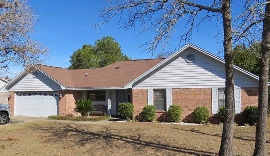 Updated Photos! LOCATION! Fantastic south Crestview property convenient to ALL bases-beat the commute while also having easy access to central Crestview. Home is located on a large, FLAT 1/3 acre lot. Main living area features vaulted ceilings, kitchen and dining has laminate flooring and ample counter space. A lot to love about this affordable home!Photos are from a previous listing and used with permission by agent. Photos will be updated when tenants vacate.Measurements are approximate and all information deemed important to be verified by buyer.