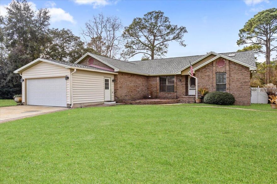 Huge Price Reduction! Motivated Seller - Bring All Offers! Don't miss your chance to own this incredible property at a newly reduced price--seller is ready to make a deal! Whether you're looking for space, flexibility, or a peaceful coastal lifestyle, 2185 Calle de Castelar in the desirable Santander community of Navarre checks all the boxes.This beautifully updated home offers a perfect blend of character, functionality, and modern upgrades. Enjoy luxury vinyl flooring, fresh paint, and a new roof for peace of mind. Sunlight pours in through abundant windows and skylights, giving the home a bright and welcoming feel.You'll love the versatile layout--from the cozy nooks to the converted garage bonus room or office, plus an additional detached garage for extra storage. A rear addition creates a separate living space with its own bedroom and bathroom, ideal for guests, extended family, or a home studio.

Step outside to the large screened porch, spacious backyard, and oversized poola perfect setup for entertaining or relaxing in the Florida sun. Inside, the fireplace adds warmth and charm to your living space.

The Santander community is known for its underground utilities, conforming mailboxes, and sidewalks, giving it a clean and cohesive appeal. Located just minutes from Navarre Beach, Hurlburt Field, and the new Publix, this home offers the perfect balance of convenience and coastal charm.
