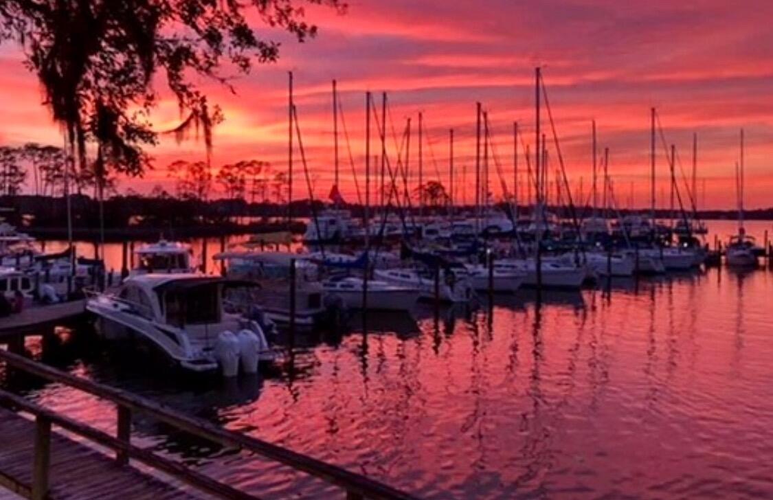 Great location with a beautiful water view. Marina, Schooners oyster bar and restaurant just steps away. Screened patio to sit and relax. Newly updated kitchen with quartz countertops. Freshly painted, popcorn ceiling removed. Electric, Water, sewer and trash included. Pets considered.