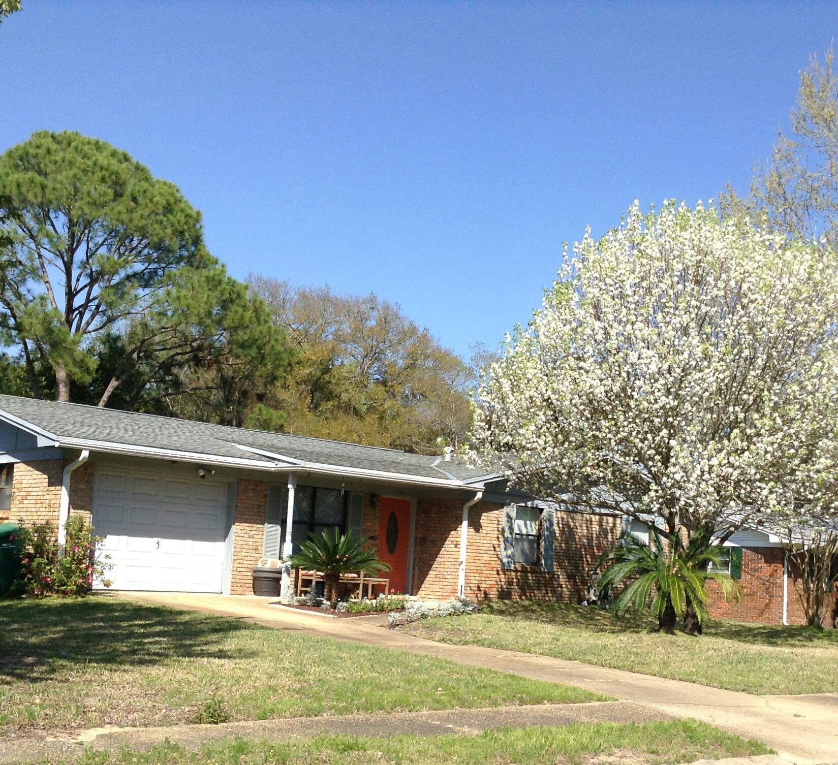 Great home! Great location! This charming 3 bed 2 bath brick home's bright kitchen has stainless appliances, Corian counter tops, 2 pantries; a breakfast bar adjoins the dining area. Master has full bath & 2 closets. 99 sf heated/cooled laundry room brings square footage to 1,232. You can use the remaining garage area to enlarge the living room, create a 4th bedroom/bath or use it for storage. Large screened patio looks onto fenced back yard w play set. New sprinkler pump last year. New portable car shelter stays as do washer, dryer, fridge & stove. Home is on a quiet street close to Hurlburt Field; elementary, middle & high schools; shopping & restaurants; Liza Jackson Park with its 1,000 feet of water front, boat ramps, fishing pier etc. Flood Zone X. Buyer to verify all information.