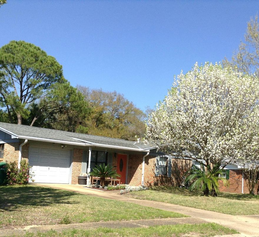 Great home! Great location! This charming 3 bed 2 bath brick home's bright kitchen has stainless appliances, Corian counter tops, 2 pantries; a breakfast bar adjoins the dining area. Master has full bath & 2 closets. 99 sf heated/cooled laundry room brings square footage to 1,232. You can use the remaining garage area to enlarge the living room, create a 4th bedroom/bath or use it for storage. Large screened patio looks onto fenced back yard w play set. New sprinkler pump last year. New portable car shelter stays as do washer, dryer, fridge & stove. Home is on a quiet street close to Hurlburt Field; elementary, middle & high schools; shopping & restaurants; Liza Jackson Park with its 1,000 feet of water front, boat ramps, fishing pier etc. Flood Zone X. Buyer to verify all information.