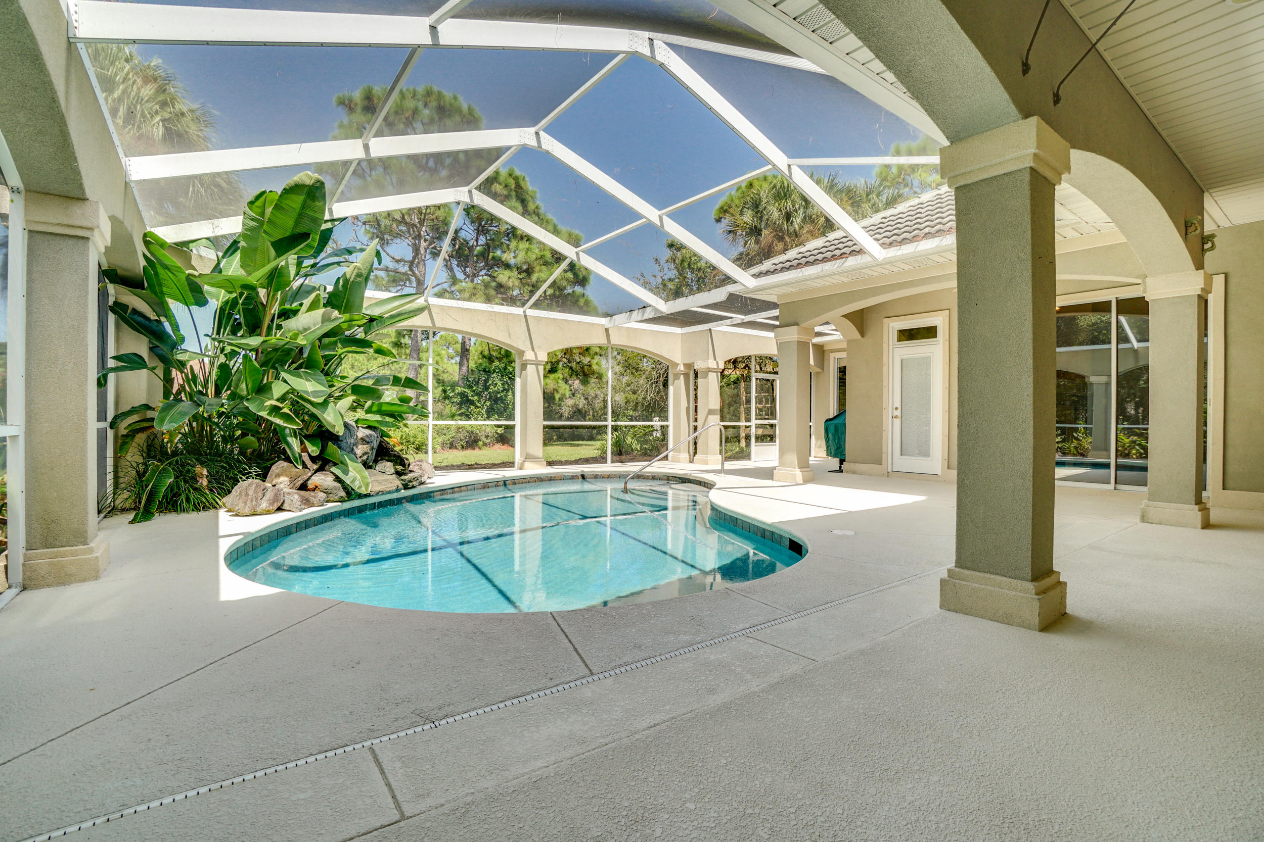 One owner, custom built Boswell home on the coveted, peaceful street of Maritime Court. Luxurious family living all on one level in the esteemed gated golf community of Regatta Bay. This sophisticated, yet relaxing haven makes the most of its tranquil, lakeside setting, allowing the beauty of surrounding nature and serene lake views to create a feeling of relaxation throughout. Enjoy your morning coffee on the dock surrounded by fruit trees in the most serene setting in the heart of Destin. It has distinct formal living and dining areas, and open kitchen and family room. Pocket door glass sliders to the enclosed, salt water pool, dining and living areas make entertainment effortless. This home has updated Luxury Vinyl [lank flooring. The Master