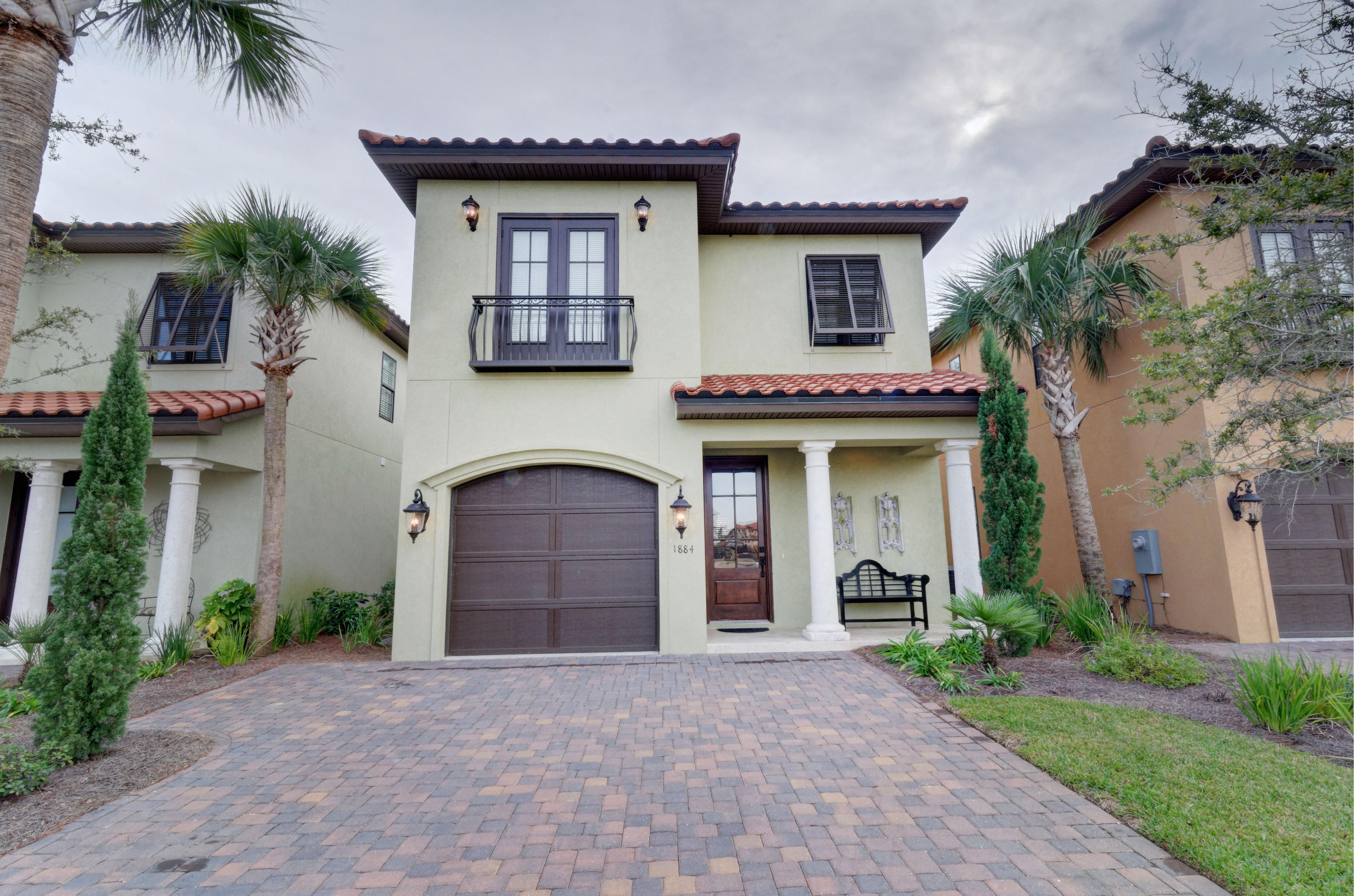 PRICE REDUCED!!This 4 Bedroom, 4 Bathroom Mediterranean style home that is situated on a large lot encompassing panoramic views of the Baytowne Golf Course. Features include hardwood flooring throughout the living area and bedrooms, travertine in the bathrooms with decorative tile. There is a large island in the kitchen with stainless steel appliances and granite counters. The main level has 10' ceilings, there is a security system and golf cart garage. The covered porch has been extended with a brick patio which is the perfect setting for entertaining. There is also a balcony off of the master for enjoying views of the lake. This pristine home has never been rented and is being sold unfurnished.