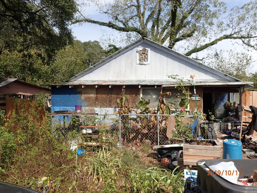 REO property in the heart of Defuniak Springs just a short drive to shopping, interstate access and schools. Home rests on a larger, nearly 1/2 acre city lot and is exposed to nearly 280sf of road frontage. Lot is completely fenced. Home was built in the 30s and is all wood shot gun style home. Right at 900 sf, this home has 3 bedrooms and 1 bath. Home has significant damage and definitely not occupant ready. At this time seller is not allowing any showings.