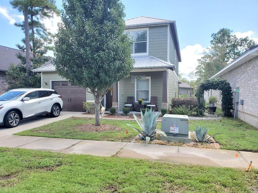 Terrific family home in popular Marina Village. This well kept home is a MUST SEE! Open floor plan with 1st Floor Master, master shower is 3 times larger than the average shower. Kitchen has ample storage, new stainless appliances & breakfast bar . Exterior & first floor have been freshly painted. Crown molding throughout. Other Features are 30 year metal roof, swing out premium vinyl windows, additional spray foam insulation, custom landscape curbing, & outdoor mosquito & insect spray making the 24x14.7 foot outdoor entertainment space user friendly. The yard has an invisible fence & lockable pet door. Home is within a half mile of LaGrange Bayou, full marina & boat launch, just minutes to the bay by boat.