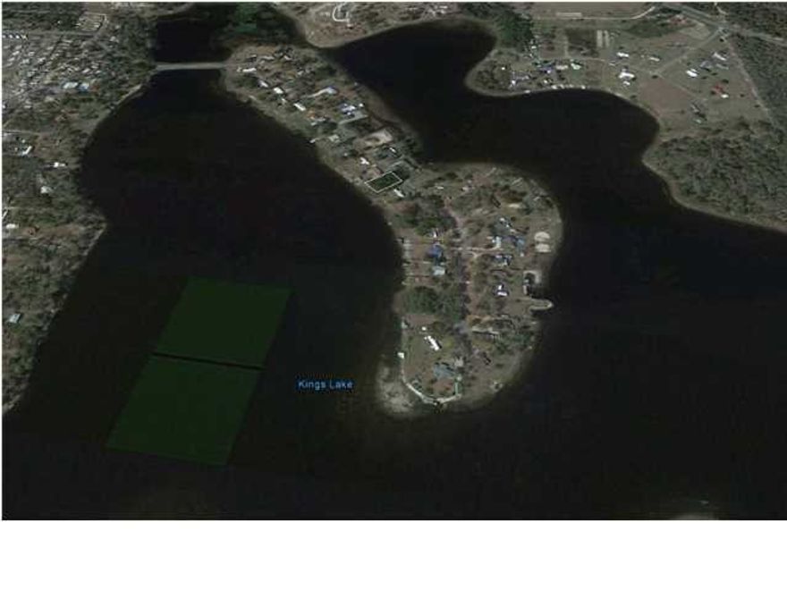 Owner says make an offer!....what a price for this waterfront lot on Paradise Island at King Lake Estates. Bring your fishing pole! King Lake, which is approximately 580 acres is well stocked with black bass, crappie, shell-cracker, and bream.