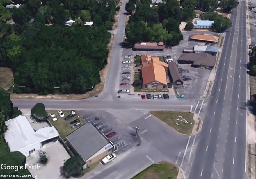 Zoned City of Crestview C-1, 150 x 150. Highway 85 visibility. The adjoining property on Alabama for sale which would give you the entire block with road frontage on three streets. There are 3 lots included in this sale.
