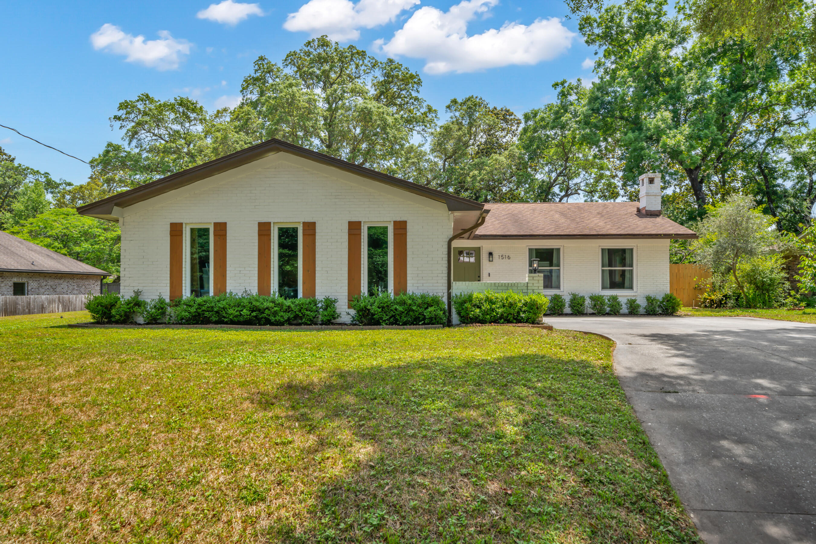 NEW ROOF TO BE INSTALLED WITH ACCEPTABLE OFFER! Welcome to your meticulously remodeled haven, where modern elegance meets cozy comfort. This captivating 3-bedroom, 2-bathroom home has undergone an extensive transformation, boasting an array of upgrades that elevate its appeal.Do not let the size of this home fool you - spanning 1400 sf, this residence is laid out so openly that it feels much larger. The open-concept design seamlessly connects the living, dining, and kitchen areas, creating a welcoming atmosphere for gatherings with family and friends.Step inside to discover a light-filled sanctuary adorned with freshly installed windows that flood the space with natural light, creating an inviting ambiance throughout.