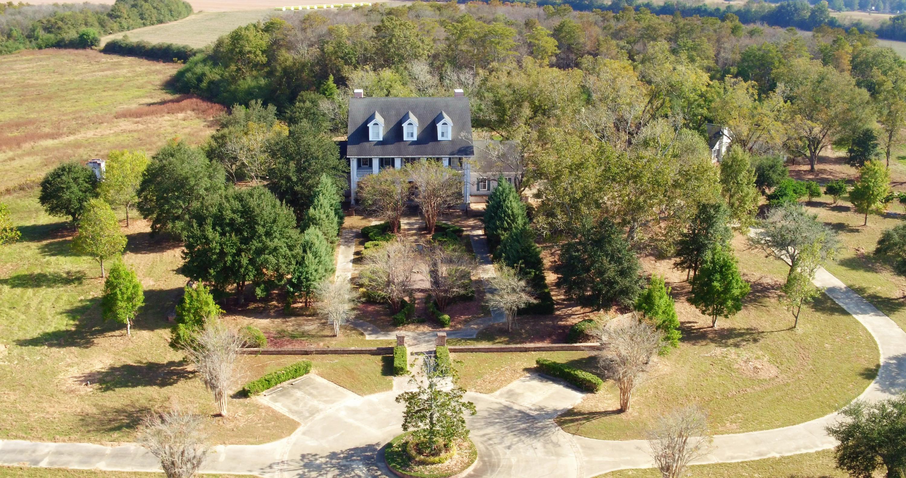 REO.This Spectacular approx. 72 acre Estate, with 11,139 Sf Mansion features,a 7 bedroom 8 bath 3 story custom Crafted home, that is fit for a king.Designed in the English Country home style this property has it all.Two gated entrances, elaborate circular drive, separate 2 bedroom guest homeand two barns. The main home will require remodeling.The horse barn has 10 stalls, feed and tack room, and office, many beautiful white board fenced paddocks surround the barn area. Trees and lush pastures are abound.The large storage barn has lots of room for all your equipment and toys.Located in the rural town of Baker, Fla. this farm offers amazing value to the investor or horse enthusiast.Priced to sell at $875,000, this property will not last. Call for showing or additional info.