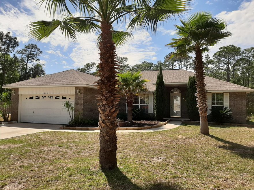 Rare opportunity to live on Innerarity Island. This 3 Bedroom/ 2 bath home sits on .37 of an acre on the exclusive Innerarity Island. Innerarity Island is a gated Community with Streets shaded by grand Oak Trees that wind around to the Community Park and Playground that overlooks Perdido Bay. This home is Move-in Ready with new flooring, fresh Paint and new Appliances. Split Floor Plan allows for Master Suite privacy with large and open Living, Dining and Kitchen in the center of the home. Large Patio for Lounging and Entertaining off of the Living Room. With such a large space, there is plenty of room for an RV and or Boat to be stored behind the home.