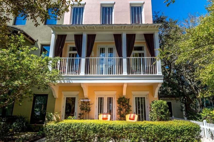 The Giving Tree, located in Seaside's beautiful Ruskin Place is a contemporary, eco-friendly, artistic tree house. The residence was completely renovated by the current owners with only the building's foundation, interior load bearing walls and exterior shell remaining from the original construction. All windows and doors were replaced, as were the electrical and plumbing systems. The original decks were redesigned for better access between levels. The new rooftop space includes an upper deck reaching the highest point Seaside building codes allow. The renovation made use of as many renewable and recycled building materials as were available at the time. For example, recycled granite counter tops and cork flooring were installation choices. To offer added expertise to the renovation, an