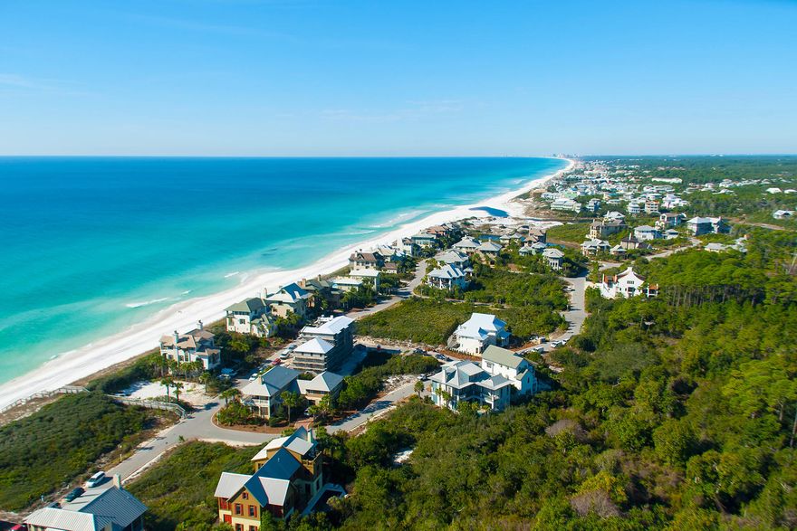 Located behind the secluded gates of The Retreat, this lot offers the perfect spot to build a beach dream home in one of Scenic 30A's most exclusive neighborhoods. This is the best priced lot currently for sale in The Retreat! The Retreat has no build out time, so you will not be rushed to complete your home, and the community is located south of Scenic 30A gulf front. This lot backs up to the greenspace of a nature conservation area, offering great privacy. The Beach Club at The Retreat features a half-moon, infinity edge pool with fountain, hot tub, beach access to nearly 3,000 feet of private white sand, private restroom facilities, shaded dining areas and grills.