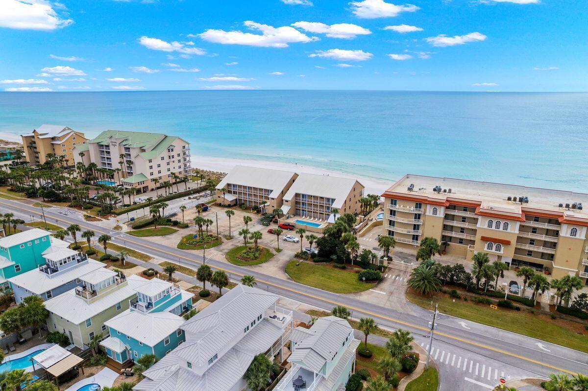 This gorgeous Gulf-front condo is a rare find! Located in the heart of Crystal Beach in Destin, this 3-bedroom, end-unit condo provides extra light and views of the gleaming gulf. Ideally located on the top floor, this condo is fully furnished and rental ready. Enjoy your private beach and heated pool in this low density building in Destin. Destin Commons is nearby with plenty of shopping and restaurants. 2021 Rental history was over $87,000 providing a great investment property, 2nd home, or combination of the two! The open living, dining and kitchen are ideal for entertaining or family get together. The balcony overlooks the emerald waters of the Gulf.
