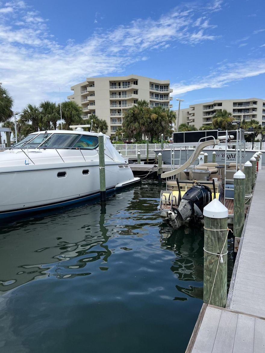 East Pass Towers marina is a great place to dock your boat on deep water just minutes to the East Pass, Choctawhatchee Bay and the Gulf of Mexico. Dock C is the last dock on the right as you enter the main gate. The slip will accommodate a very large vessel. There is a long pier down the length of the slip. The marina offers a gated entry for security & privacy, fish cleaning & pump station, electric service, cable, phone, and water. Buyer should verify any & all information including dimensions, boat slip & lift accommodations.