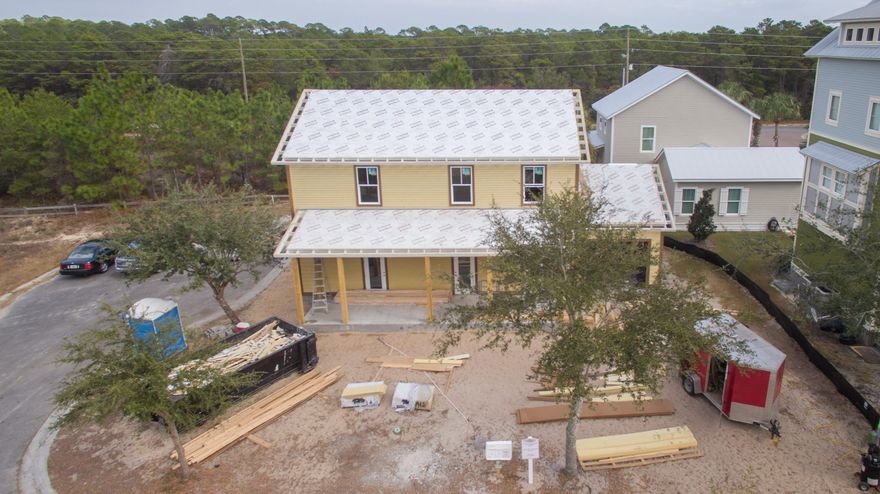 Beautifully designed, new construction cottage in the Village at Blue Mountain Beach. Located on a quiet large corner cul-de-sac, this extremely well constructed home will be completed early 2017. This cul-de-sac really pulls the flow of this property and offers up more than ample parking. The large, southern front porch is a wonderful place to relax with family and friends. The 1st for has 10' ceilings and an open floor plan. All doors are 8' and home will be completed with hard wood floors throughout. The kitchen is well designed with an island, granite counter tops, recessed lighting, and all top of the line appliances. Also, located on the 1st floor is a large bedroom, full bath and a half bath.