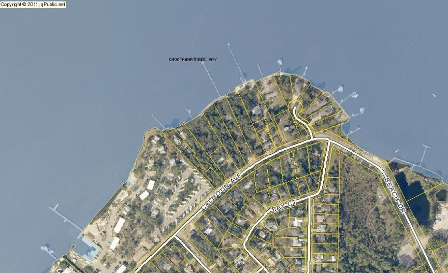 This could be the one!!100 ft. of water front, seawall in place and dotted with majestic Oak and Magnolia trees.Amazing sunsets await when you build your own private paradise. There is plenty of room on this estate sized lot to build a main house with outdoor kitchen and entertainment space you've been dreaming of as well as a guest house. Come see this incredible view for yourself.Property is zoned ''single family, residential, low density'' and can not be split.