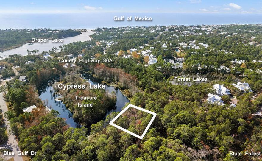 Enjoy this beautiful .25 (approx 105x110) acre vacant waterfront lot on Cypress Lake nestled just steps from 30A.  Located in the heart of Blue Mountain Beach, Cypress Lake is a non-HOA community rich with natural wildlife and is perfect for kayaking, fishing, and enjoying 30A's pristine sunrises and sunsets.  Gulf Hills Estates affords exclusive privacy and a quiet beach retreat experience, all while being within walking and biking distance to all of the favorite amenities Blue Mountain Beach has to offer.   Don't miss your chance to build a dream vacation home in this exclusive burgeoning neighborhood along 30A.