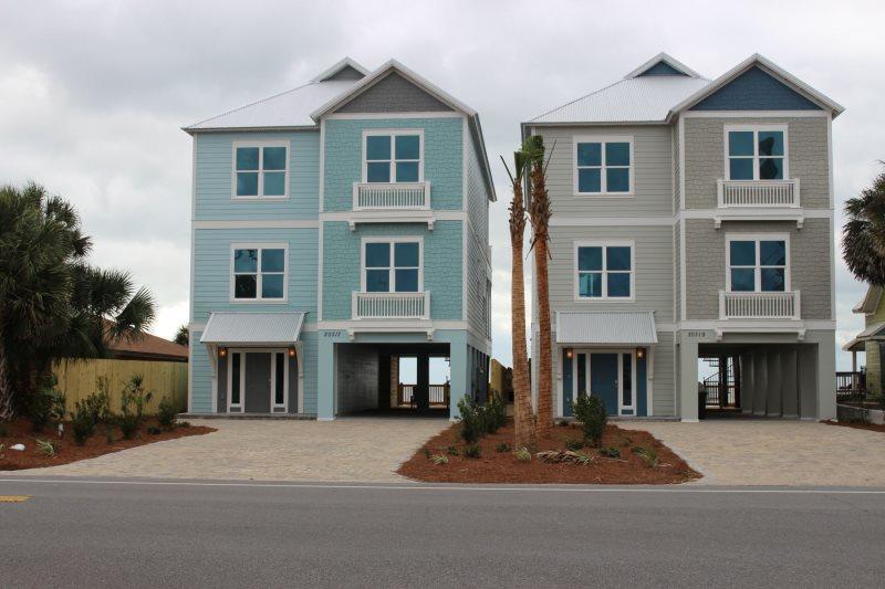 Construction just completed. Great Beach house with over 3650 square foot of conditioned air, 6 bedrooms, bunk area and bunk room, 6.5 baths, three decks, pool on second level and outdoor kitchen and entertainment area and private walkover to Gulf. Floor plan is designed to sleep up to 24 people and is a proven income package and already on rental for summer with bookings scheduled starting in April. Unit can do over 200,000 annually and is a proven income model. Unit is fully furnished and decorated by Coastal Charm interiors and Unit is on Holiday Beach Rentals program. This is the only new construction on the highly desirable West End with a very convenient access from Panama City Parkway.