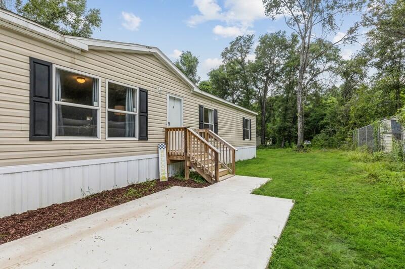 BACK ON MARKET: Multiple offers received!Want a spacious affordable home in the heart of Crestview on .42 acres with a small shed? You found it! Amazing location, central to nearby child care facilities, shopping, dining, schools etc. Once inside you will love the open split bedroom floor-plan with two living areas, a dining area, and kitchen with island. The master bedroom has a retreat area for your office or workout or reading nook...you decide. The Master bathroom features a double vanity, HUGE walk in closet, a separate garden tub and walk-in shower. There are two additional bedrooms both with a large walk-in closet and a shared guest bathroom. This home's road frontage is 88 ft, but the .42 acre lot goes back for 210 ft! Lots of room to add a workshop. Call Today!