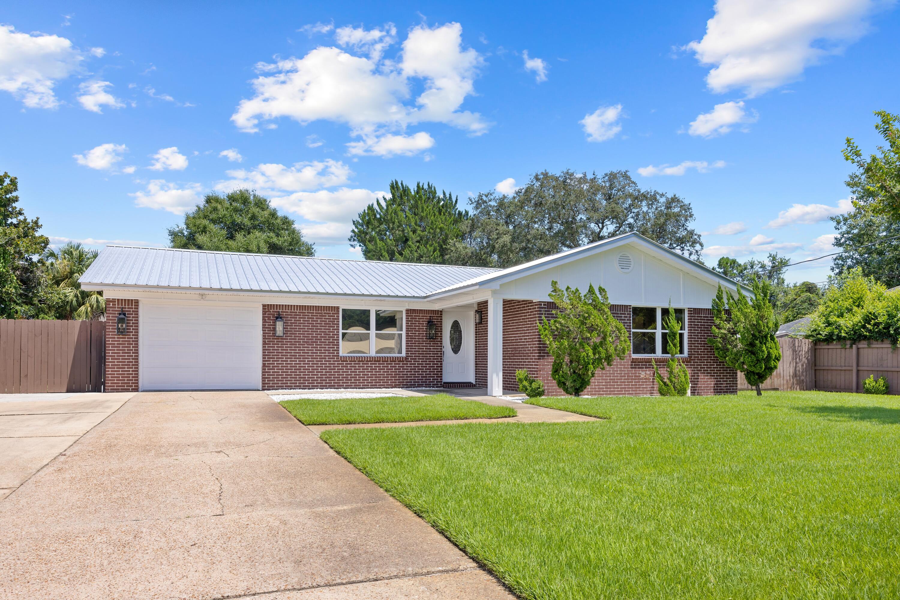This impeccably renovated home is ready to move in! From the upscale finishes, to the double lot, you will be amazed around every corner. torn down to the studs, this home has been renovated with intent and attention to every detail. 3 bedrooms, 2 full bathrooms and an amazing heated and cooled sunroom make this home hard to beat. Do not wait to check this one out! Make your appointment today before your opportunity passes you by!