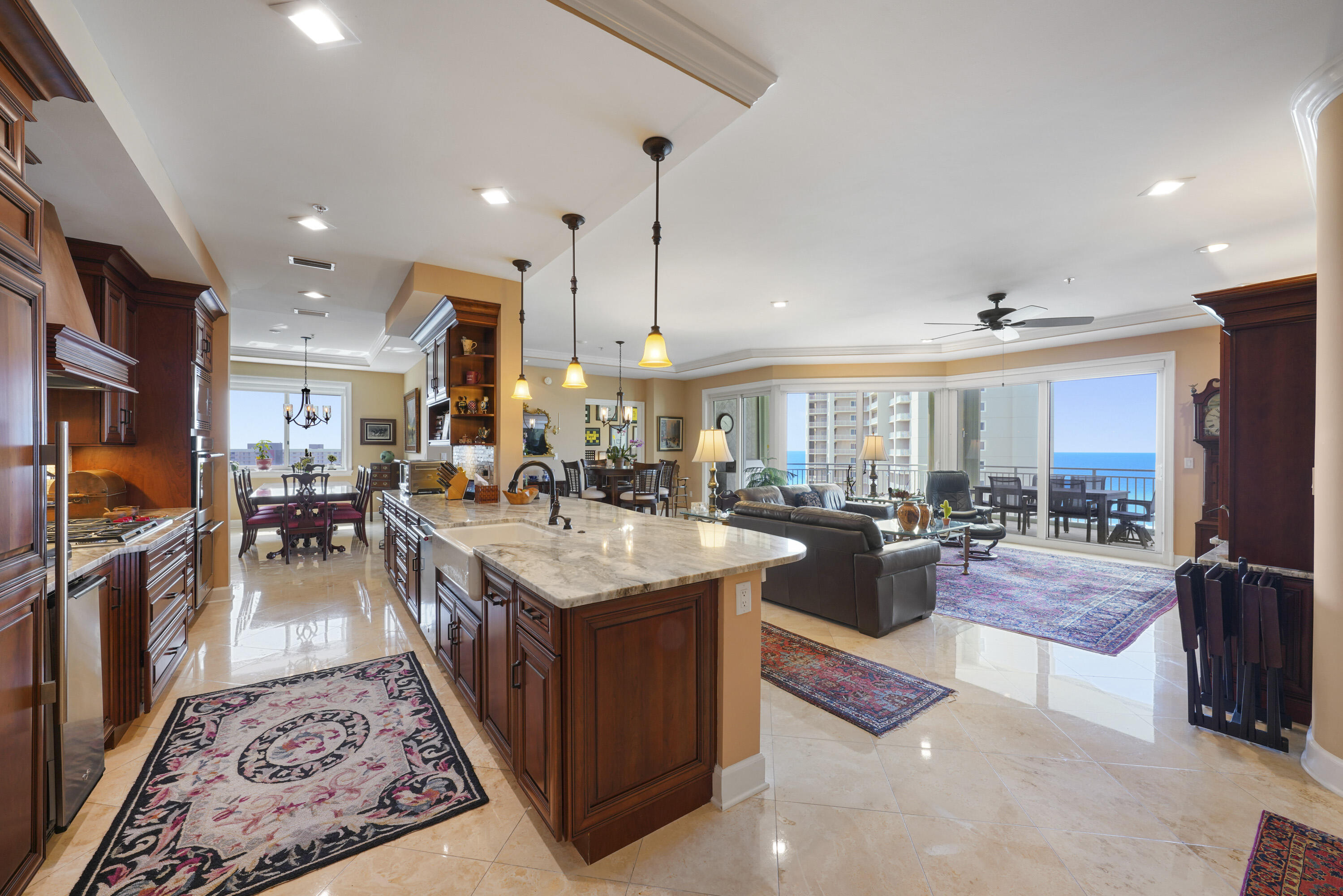 Experience the ultimate beachfront lifestyle in this exquisite, rental restricted, 4 bedroom, 4 bathroom condo in the heart of Miramar Beach. This stunning condo boasts 3,030 sq. ft of living space with breathtaking views of the Gulf of Mexico and offers unparalleled luxury and comfort. This Villa in Grand Dunes is well maintained and perfectly located on the 6th floor of Grand Dunes Il, giving it an 8th floor elevation and the views are fantastic! It will convey unfurnished as it is the seller's primary residence. This villa is the largest Villa in all of Grand Dunes II. As you enter the Villa, you will be greeted by an open-concept living space, which is perfect for entertaining guests. The living area features floor-to-ceiling glass that let in plenty of natural light, and offer panoramic views of the emerald green waters of the Gulf and sugar white sands of South Walton. Features of this villa include: honed sealed and polished travertine flooring in private foyer, living areas, kitchen, hallways and baths, and hardwood floors in the Gulf front guest suite/office. Other features include: Samsung HE washer/dryer, built-in GE water softener, new water heater installed in 2019 and 5 ton, 17 seer HVAC system installed in 2018.
The gourmet kitchen is a chef's dream with high-end stainless steel appliances that include: a "Wolf" natural gas cooktop, Sub-Zero fridge with matching cabinet face, "Kitchenaid" double ovens and dishwasher, and a double door pull out pantry. The kitchen also features custom granite countertops and bar, custom vented hood, and deep custom farm sink. Additionally, the kitchen offers custom built-in "Thomasville" cherry cabinetry with soft close, and new fixtures throughout.
The living area offers: flush mount LED lighting, manual solar shades, a dry bar and built-in custom cherry cabinetry. Other features are 9.5' ceilings, "super quiet'' interiors, pre-wired for latest security and audio/visual for home entertainment, solid wood interior doors, and oversized glass with beautiful views of the Gulf.
The Master Suite is a true oasis that offers: "His & Hers" walk-in closets, trayed and coffered ceilings, and a sitting area. The Master bath offers: dual granite vanities with soft-close drawers, a separate dual head shower, a spa-like jetted soaking tub with travertine surround, and a separate water closet. Step out onto the balcony and absorb the breathtaking views of the Gulf. Sip your morning coffee as you watch the sunrise over the water, or enjoy a glass of wine as you watch the sunset over the horizon. This is an 11' deep Gulf front balcony with over 350 sq. ft of space, a built-in natural gas grill, and all protected by "Hurricane Shutters."
This luxury condo is located in one of the most sought-after communities in Miramar Beach, with world-class amenities such as a fitness center, a heated swimming pool, and a hot tub. The
complex also offers direct beach access, so you can easily stroll down to the white sand beaches and emerald green waters of the Gulf.
Grand Dunes offers: "Super Quiet Interiors", 24 hour security, gated entry, lush landscaping, 3 levels of gated underground parking for owners, grand lobby, semi-private elevators leading into your private foyer, private heated pool & hot tub, Owner's Lounge with Gulf front Fitness Room, Over-flow suites for guests, 200' of deeded beach, serene streams, majestic waterfall and a Lagoon Style Gulf front pool area with Hot Tub shared by both buildings and Beach Service.
Grand Dunes is the Emerald Coast's Most Desired Rental Restricted Beachfront Development!
Call us today to schedule your private viewing of this gorgeous Villa!