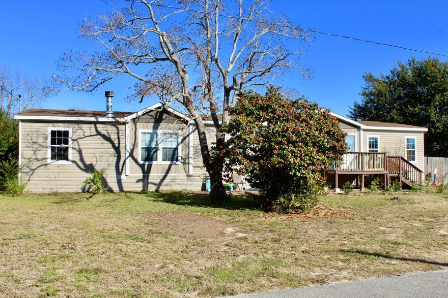 Close to Hurlbert! We have a beautiful 4 bedroom and 2 bathroom with 2280 sqft. There is carpet in the bedrooms and laminate flooring throughout the rest of the home. When you walk in the front door you have a living room and the spacious master bedroom is off the living room. The formal dining room has barn doors to close it off from the living room. There is a second living space with a stone fireplace and off that room is 2 bed rooms, bath and laundry room. The kitchen has granite counter tops with an island in the middle, farm style sink and a pantry with a barn style door and the 4th bedroom is off the kitchen. There is some recessed lights throughout the home and crown molding throughout. There is an above ground pool and a shop that is a 16X40 with power. Schedule your showing today