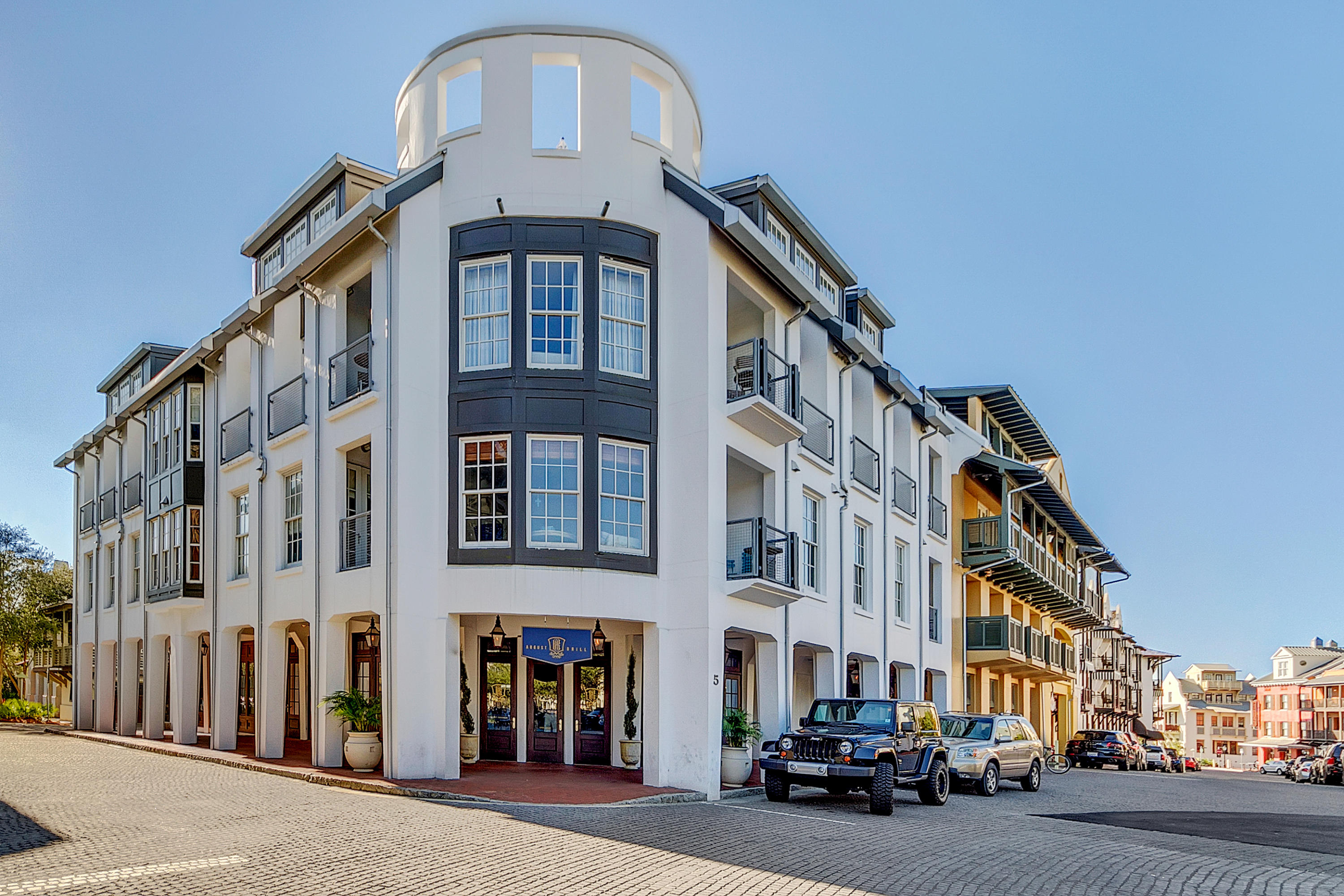 LOCATED IN THE HEART OF ROSEMARY BEACH ON THE GULF SIDE, this spacious Penthouse unit features Viking appliances, hardwood floors, granite countertops, slate tiles, Kohler plumbing fixtures and mahogany doors. The four Bedrooms enjoy en suite baths and 3 of the 4 are adjacent to a private balcony.  French doors open to the walled, oval Belvedere creating an outdoor room with access from the Dining and Living areas.  The perfect place to enjoy views of Rosemary Beach, the gulf and beyond. In addition, this unit has a garage and second parking space.  A wonderful amenity in Town Center!