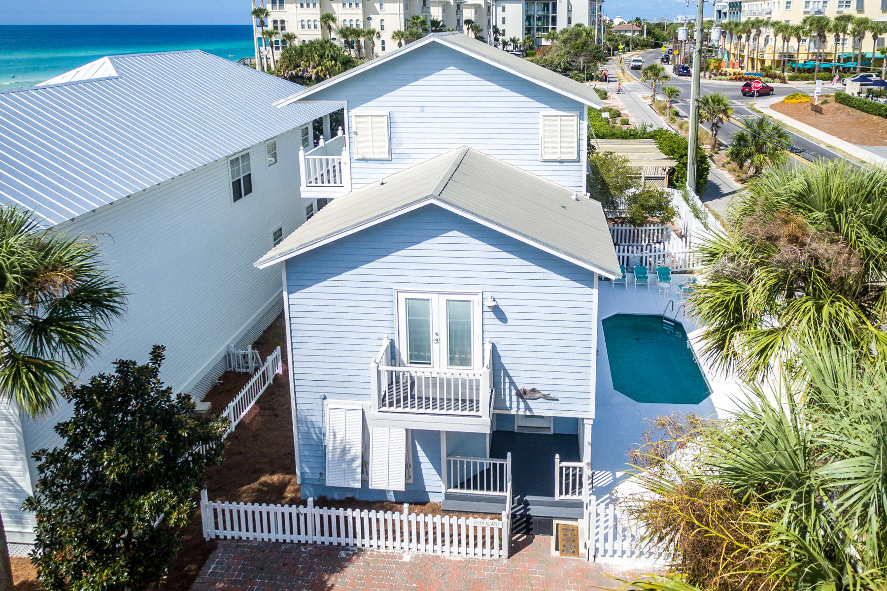 Classic Florida Beach Cottage south of 30A with plenty of parking, a private pool AND gulf views ! Just steps to one of the community beach walkovers, this cottage is an ideal vacation rental property with a solid rental history-and room to improve. Set up for families, kids, entertaining and enjoying the beach with four bedrooms, three full baths, an open floor plan off a large kitchen and a huge rear deck off living area with gulf views. A must have private heated pool rounds out the amenities. New impact doors and windows (low insurance rates), new flooring, appliances, gas pool heater, bead board wainscoting and much more. Sunrise Beach is a gated gulf front, rental friendly community located near Gulf Place, Shunk Gulley, Pecan Jacks and more. Make this your vacation paradise.