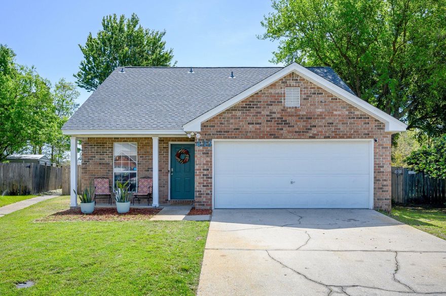 Multiple Offers. Highest & Best Offer Deadline Sun 4/24 at 2pm.This charming two story, 3 bedroom 2.5 bath, brick home is located on a private cul-de-sac just minutes away from white sandy beaches and backing up to Florosa Elementary School.  The neighborhood has it's own private walkway leading directly to the school so you can safely make the short walk without ever going onto a major road.  You do not have to worry about noise because a wooded lot located between the fenced in back yard and the school provides a nice quiet buffer.  When you enter the home you are greeted by beautiful dark vinyl floors that lead into an open kitchen, dining and living room with nice high vaulted ceilings.  This space is great for entertaining and leads out to the peaceful fenced in yard and outdoor patio